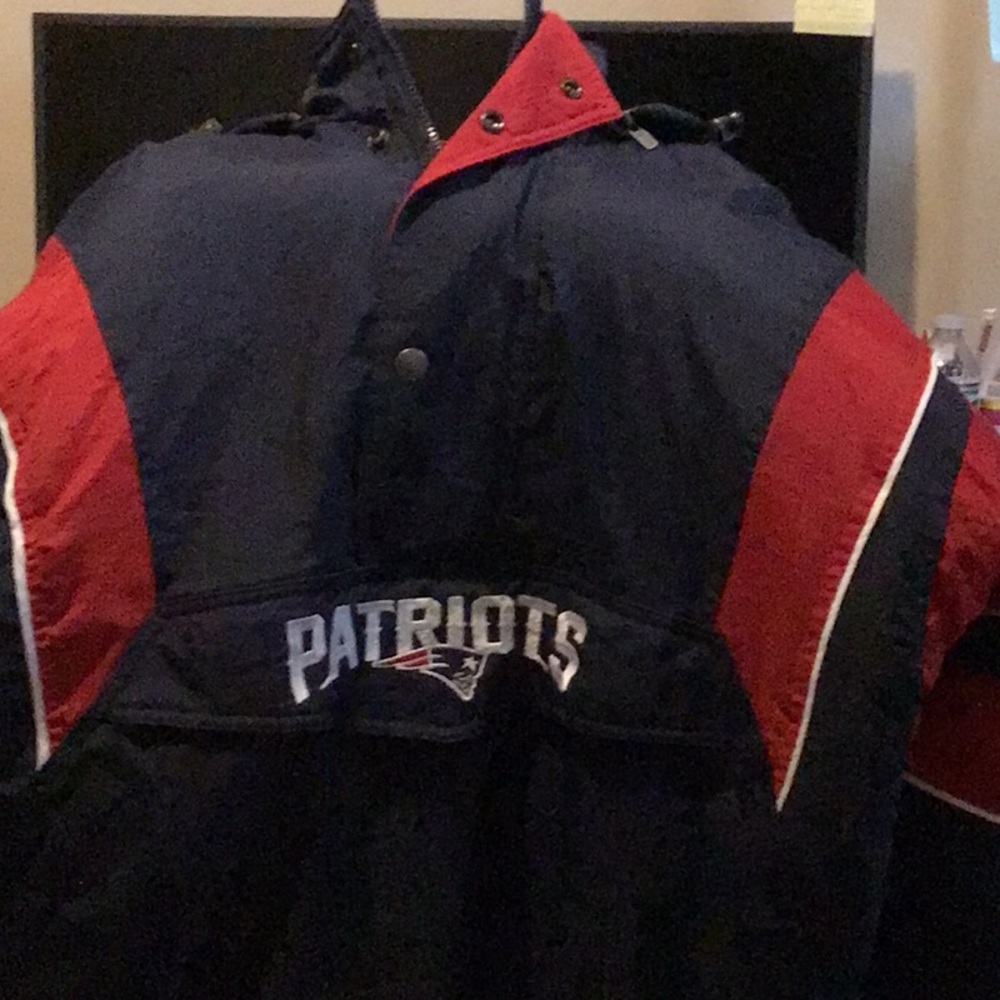 Hooded half zip New England Patriots padded jacket.